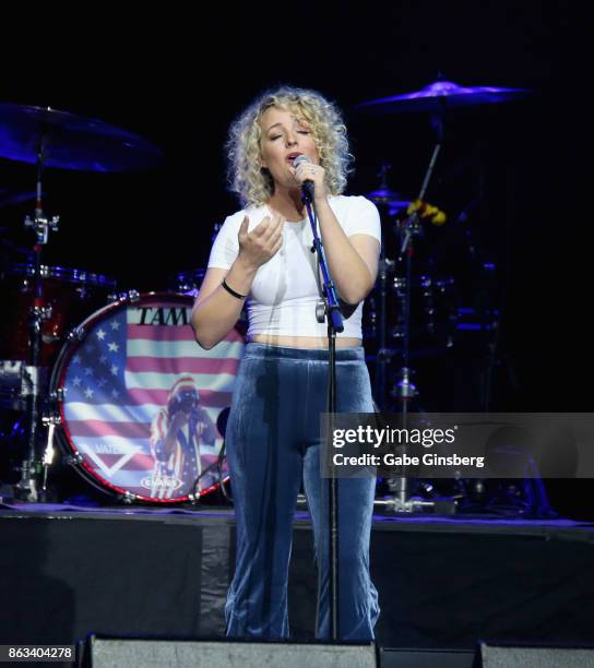 Singer/songwriter Cam performs during "Vegas Strong - A Night of Healing" at the Orleans Arena on October 19, 2017 in Las Vegas, Nevada. The concert...