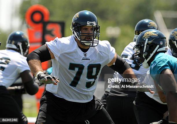 Tackle Tony Pashos of the Jacksonville Jaguars sets to block May 1, 2009 at a team minicamp near Jacksonville Municipal Stadium in Jacksonville,...