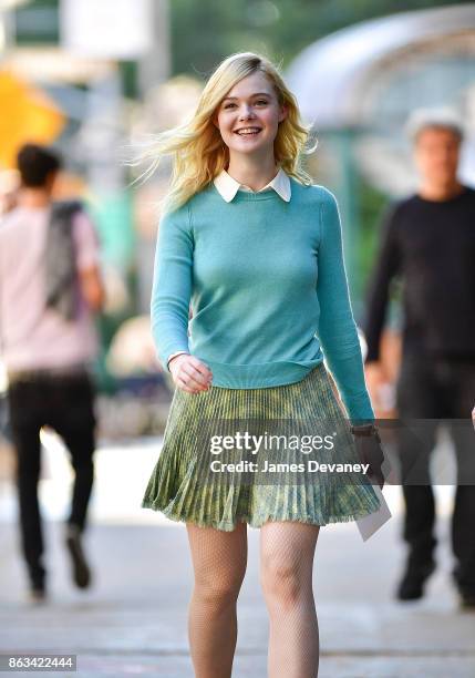 Elle Fanning seen on location for Woody Allen's untitled movie in Tribeca on October 19, 2017 in New York City.