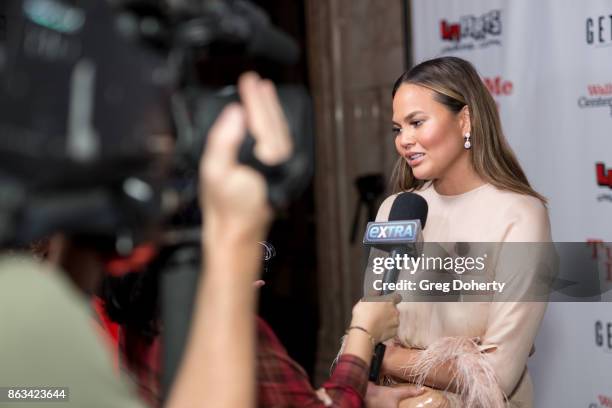 Chrissy Teigen and John Legend attend "Turn Me Loose" at Wallis Annenberg Center for the Performing Arts on October 19, 2017 in Beverly Hills,...