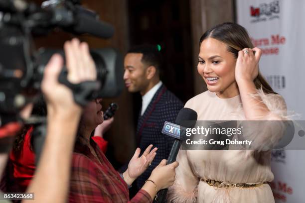 Chrissy Teigen and John Legend attend "Turn Me Loose" at Wallis Annenberg Center for the Performing Arts on October 19, 2017 in Beverly Hills,...