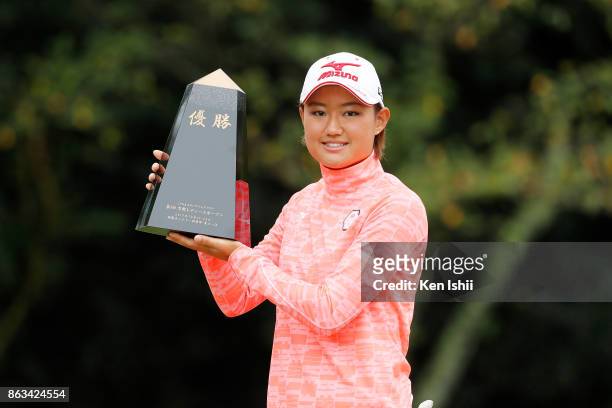 Mao Nozawa of Japan holds the trophy after her victory the final round of the Kyoto Ladies Open at the Joyo Country Club on October 20, 2017 in Joyo,...