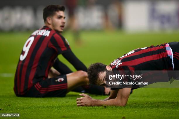 Andre Silva and Giacomo Bonaventura of AC Milan look dejected during the UEFA Europa League football match between AC Milan and AEK Athens. The match...