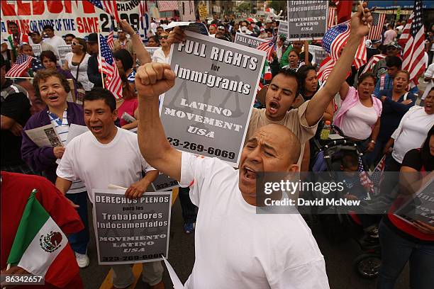 Joaquin Ventura and others rally for immigrant worker rights on May Day, May 1, 2009 in Los Angeles, California. Thousands of people are...