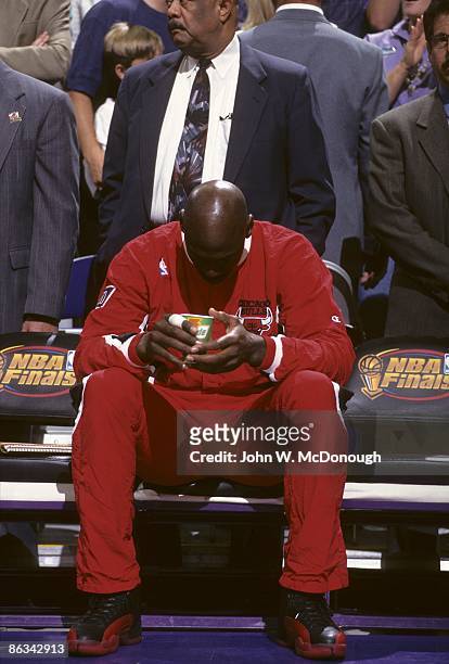 Playoffs: Chicago Bulls Michael Jordan on bench during game vs Utah Jazz. Jordan was sick with the flu. Game 5. Salt Lake City, UT 6/11/1997 CREDIT:...