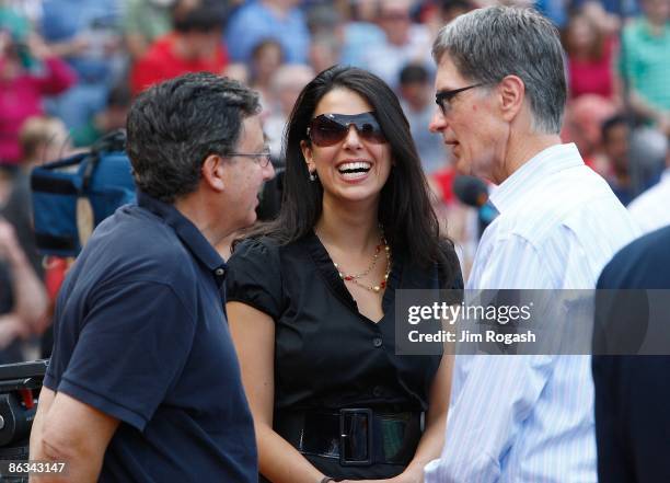 Linda Pizzuti stands by her fiance, Boston Red Sox owner John Henry, and Tom Werner before a game against he New York Yankees of the Boston Red Sox...
