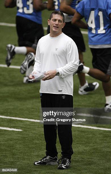 Head coach Jim Schwartz of the Detroit Lions looks on during rookie orientation camp at the Detroit Lions Headquarters and Training Facility on May...