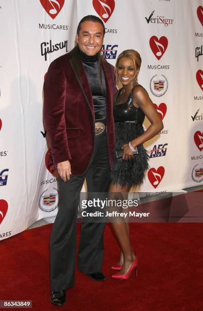 Stylist Nick Chavez and Sylvie arrive at the 2008 MusiCares Person of the Year gala honoring Aretha Franklin held at the Los Angeles Convention...