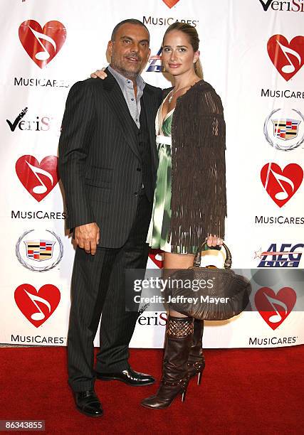 Designer Christian Audigier and guest arrive at the 2008 MusiCares Person of the Year gala honoring Aretha Franklin held at the Los Angeles...