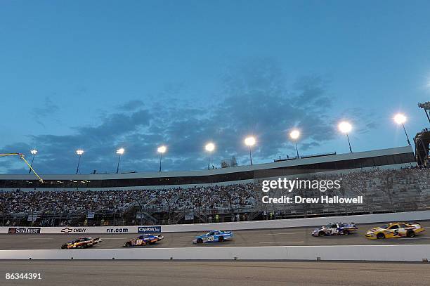 Mike Bliss, driver of the Miccosukee Indian Gaming & Resort Chevrolet drives during the NASCAR Nationwide Series Lipton Tea 250 at Richmond...