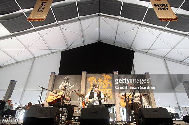 Doc Watson performs during the 40th Annual New Orleans Jazz & Heritage Festival Presented by Shell at the Fair Grounds Race Course on May 1, 2009 in...