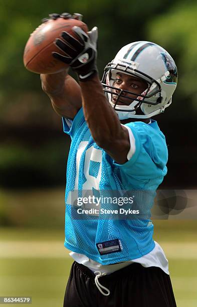 Rookie Jason Chery of the Carolina Panthers catches some balls as he puts in some extra time after the minicamp practice at the team's practice...