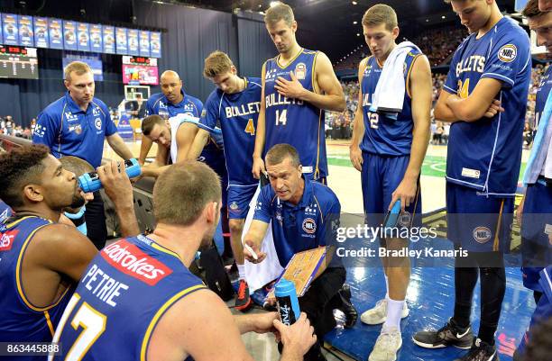 Coach Andrej Lemanis of the Bullets talks to his players during a time out in the round three NBL match between the Brisbane Bullets and the Cairns...