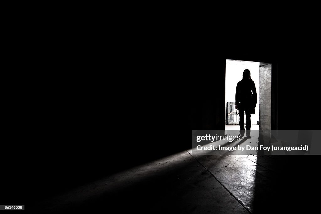 Silhouette shadow of man in doorway
