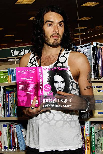 Comedian, Author Russell Brand entertains fans at his book signing for his new book "My Booky Wooky" at Barnes & Noble at The Grove on May 1, 2009 in...