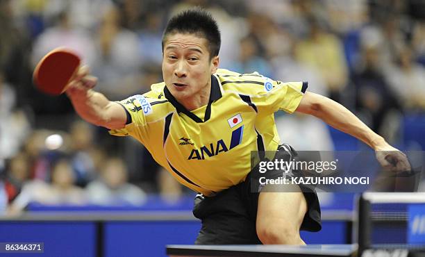 Japan's Kaii Yoshida returns the ball against South Korean Kim Jung Hoon during their men's singles fourth round match in the World Table Tennis...
