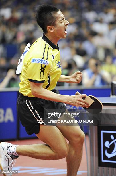 Japan's Kaii Yoshida celebrates his win over South Korean Kim Jung Hoon during their men's singles fourth round match in the World Table Tennis...