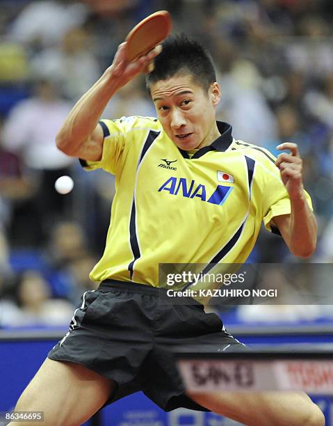 Japan's Kaii Yoshida returns the ball against South Korean Kim Jung Hoon during their men's singles fourth round match in the World Table Tennis...
