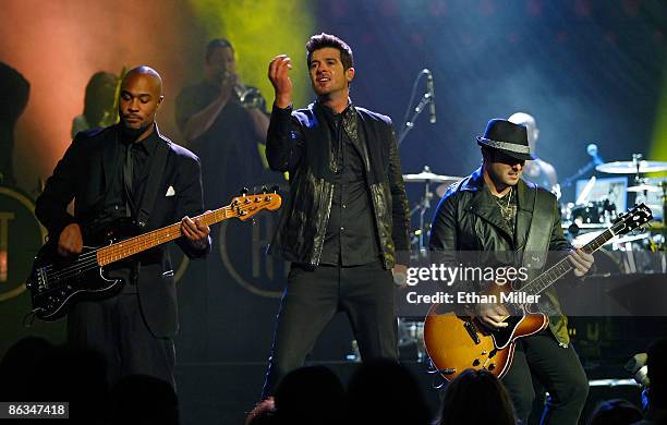 Bassist Greg Malone, singer Robin Thicke and guitarist Andrew McKay perform at The Pearl concert theater at the Palms Casino Resort May 1, 2009 in...