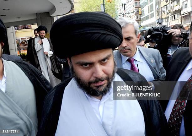 Iraq's Shiite radical leader Moqtada al-Sadr leaves after his meeting with Turkey's top two leaders Prime Minister Recep Tayyip Erdogan and President...