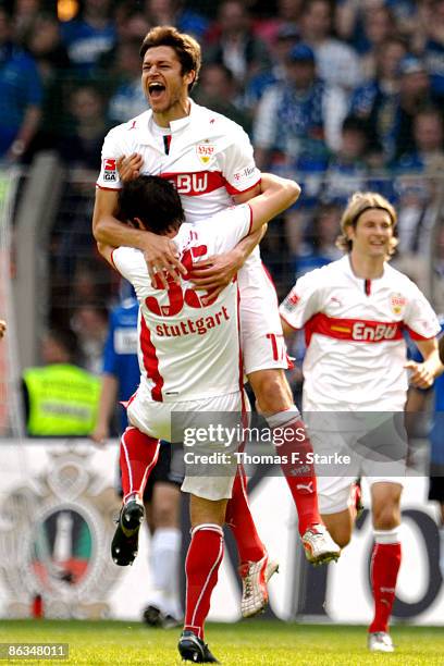 Matthieu Delpierre and Christian Traesch of Stuttgart celebrate their first goal during the Bundesliga match between Arminia Bielefeld and VfB...