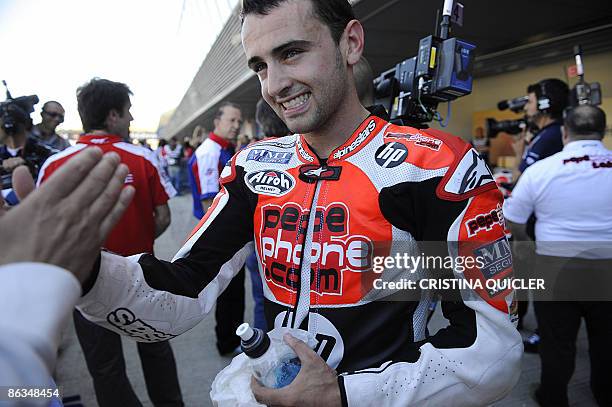 Pepe World's Spanish Hector Barbera talks with the press after the 250 cc qualifying session of the Spanish Grand Prix at the Jerez racetrack on May...
