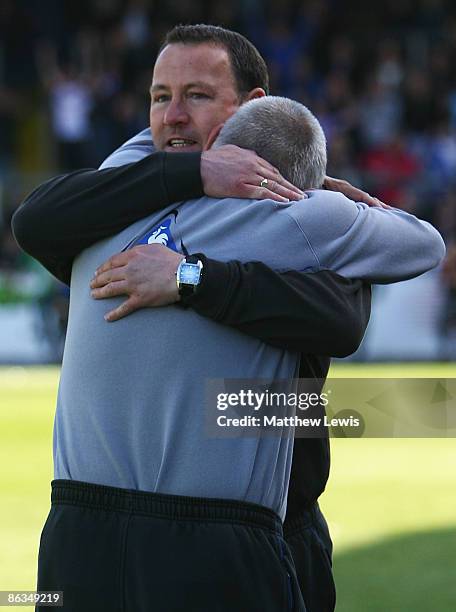 Greg Abbott, manager of Carlisle United celebrates after his team stay up in League One during the Coca-Cola Football League One match between...