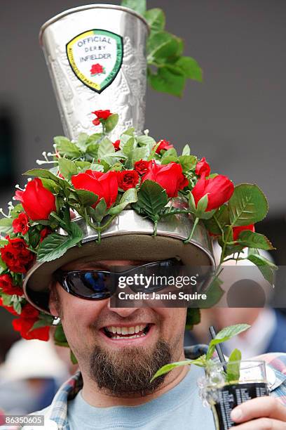 Race fan with a mint julep in his hand and a hat shaped like one during the 135th running of the Kentucky Derby on May 2, 2009 at Churchill Downs in...