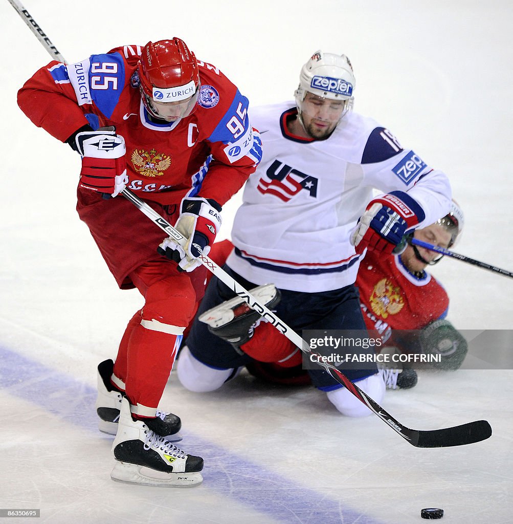 Russia's Alexei Morozov (L) controls the