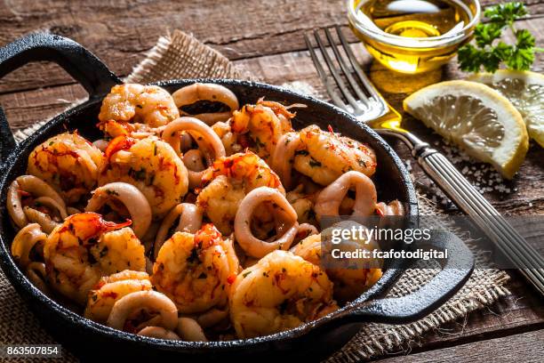 Fried Calamari Rings Photos and Premium High Res Pictures - Getty Images
