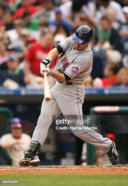 Outfielder Daniel Murphy of the New York Mets swings at a pitch during a game against the Philadelphia Phillies at Citizens Bank Park on May 2, 2009...