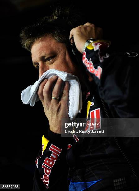 Ryan Pemberton, Crew Chief for the Red Bull Toyota driven by Brian Vickers, covers his mouth with a towel during the NASCAR Sprint Cup Series Crown...