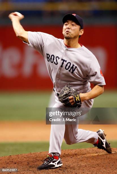 Relief pitcher Takashi Saito of the Boston Red Sox pitches against the Tampa Bay Rays during the game at Tropicana Field on May 2, 2009 in St....