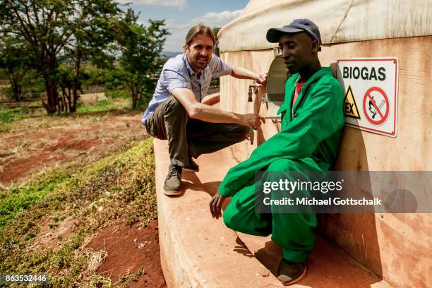 Thika, Kenya A worker at environmentally friendly and renewable energy bio gas generation in the Thika area at an avocado oil mill of Olivado company...