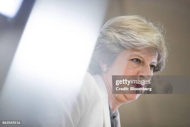 Theresa May, U.K. Prime minister, pauses during a news conferenceat a European Union leaders summit in Brussels, Belgium, on Friday, Oct. 20, 2017....