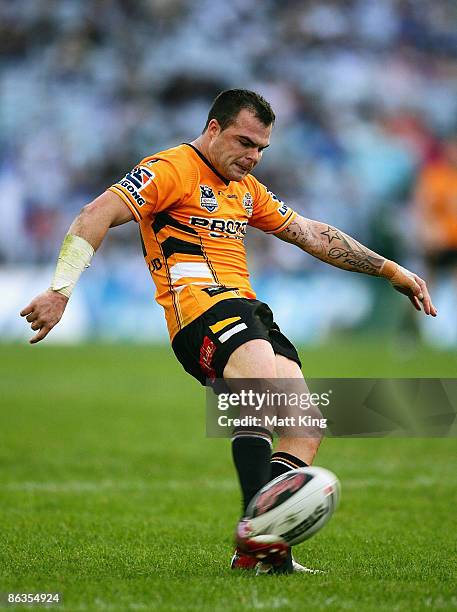 Shannon Gallant of the Tigers misses a conversion attempt in the final minutes to level the scores during the round eight NRL match between the...
