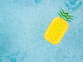Inflatable pineapple on pool