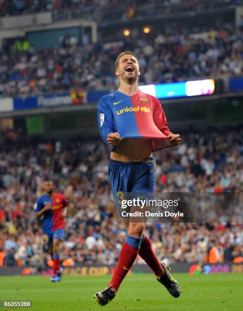 Gerard Pique of Barcelona celebrates after scoring Barcelona's sixth goal during the La Liga match between Real Madrid and Barcelona at the Santiago...