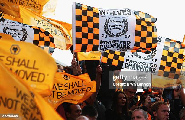 Wolves fans celebrate their promotion to the Premiership during the Coca Cola Championship match between Wolverhampton Wanderers and Doncaster Rovers...