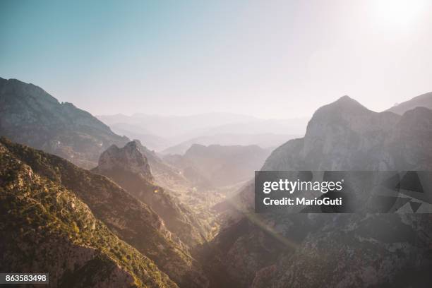 narrow valley in picos de europa, spain - clear sky mountain stock pictures, royalty-free photos & images