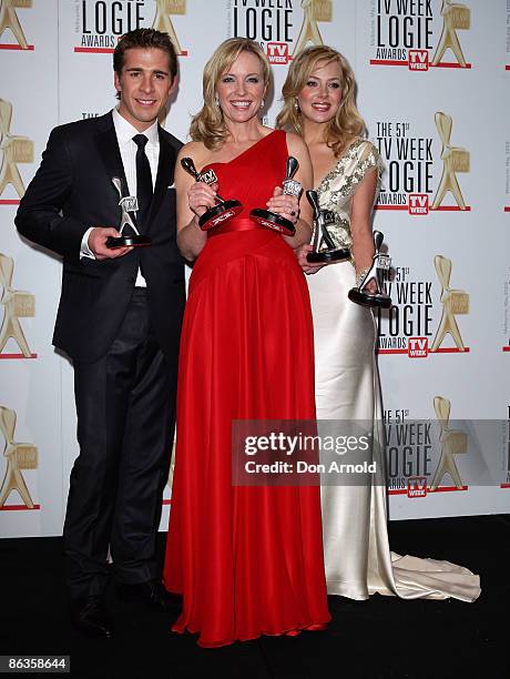 Actors Hugh Sheridan, Rebecca Gibney and Jessica Marais pose with their awards during the 51st TV Week Logie Awards at the Crown Towers Hotel and...