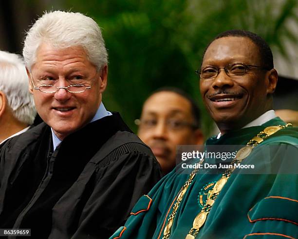 Former President Bill Clinton and Florida A&M University's President James H. Ammons sit during the '09 graduation at Florida A&M University on May...