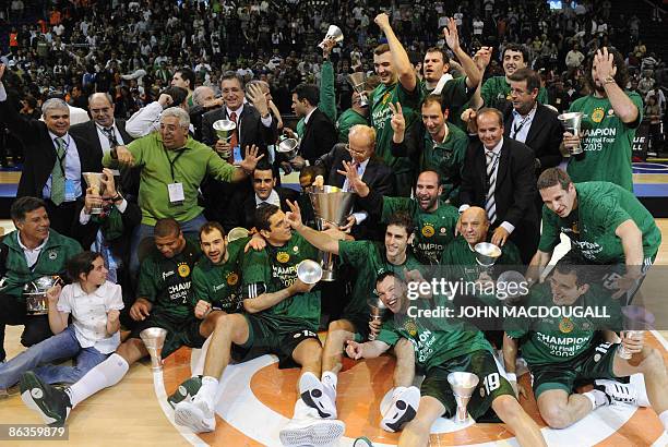 Panathinaikos players celebrate with the trophy after Panathinaikos Athens defeated CSKA Moscow in the final of the basketball Euroleague Final Four...