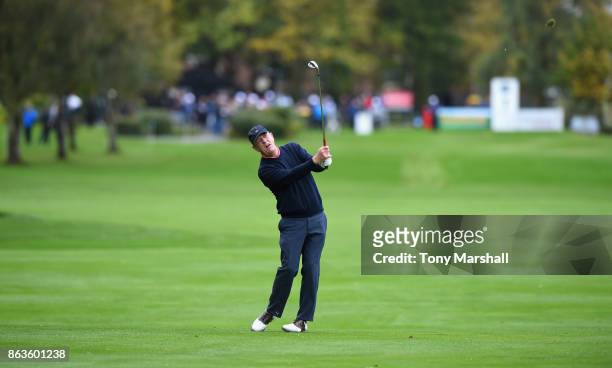 Carl Mason of England plays his second shot on the 1st fairway during Day One of the Farmfoods European Senior Masters at Forest Of Arden Marriott...