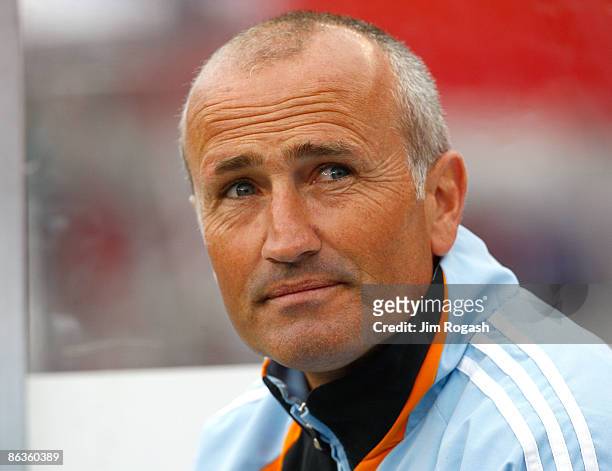 Coach Dominic Kinnear of the Houston Dynamo watches the action before a game against the New England Revolution at Gillette Stadium on May 3, 2009 in...