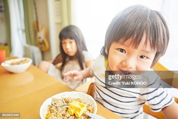 brothers in the meal - calais stock pictures, royalty-free photos & images