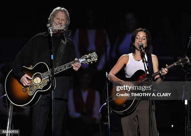 Kris Kristofferson and Ani DiFranco perform during a concert for folk music legend Pete Seeger at Madison Square Garden in New York on May 3, 2009...