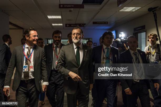 Spain's Prime Minister Mariano Rajoy leaves after a press conference on the second day of European Council meetings at the Council of the European...