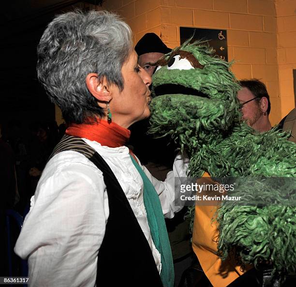 Exclusive* Joan Baez and Oscar the Grouch backstage at the Clearwater benefit concert celebrating Pete Seeger's 90th birthday at Madison Square...