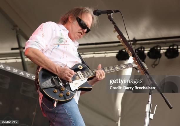 Neil Young performs during the 40th annual New Orleans Jazz & Heritage Festival at the Fair Grounds Race Course on May 3, 2009 in New Orleans.